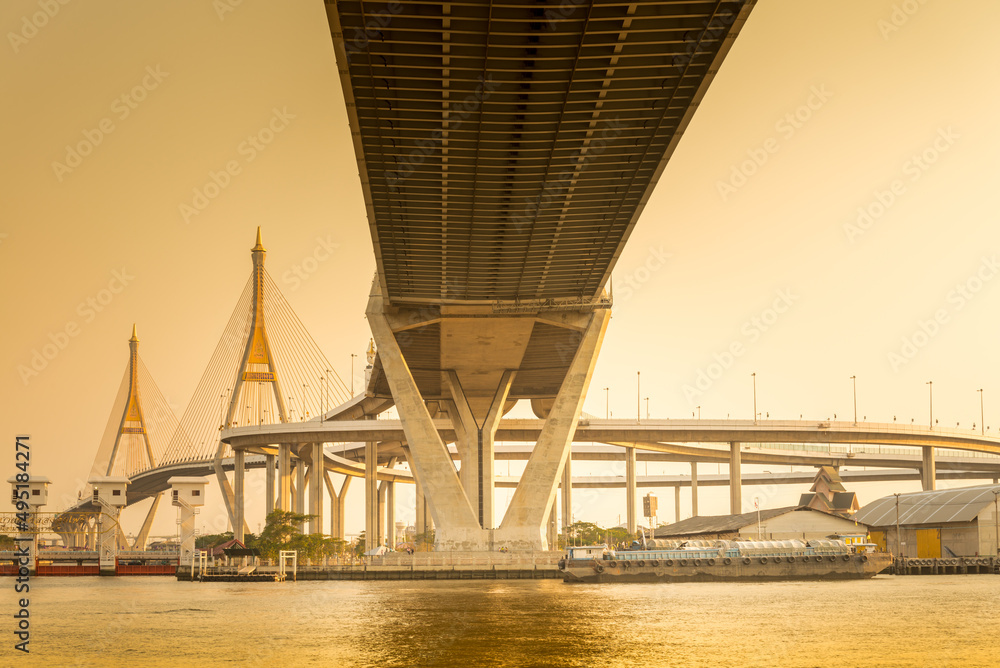 Bhumibol suspension bridge over the Chao phraya river in Bangkok, Thailand. Building and architecture, transportation concept.