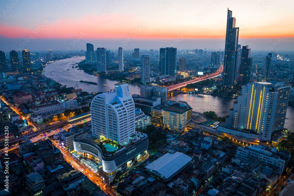 Obraz premium Twilight evening cityscape of modern capital Bangkok city, Thailand. Building, architecture and city concept. 