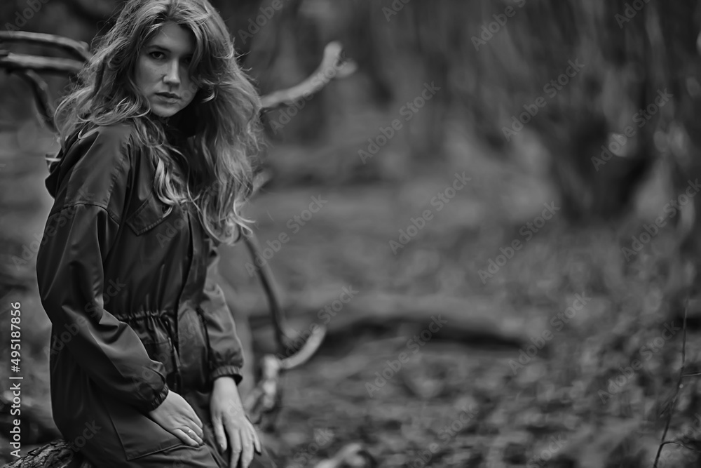 gloomy autumn park girl portrait, unusual toning autumn look model gloomy autumn park girl portrait, unusual toning autumn look model