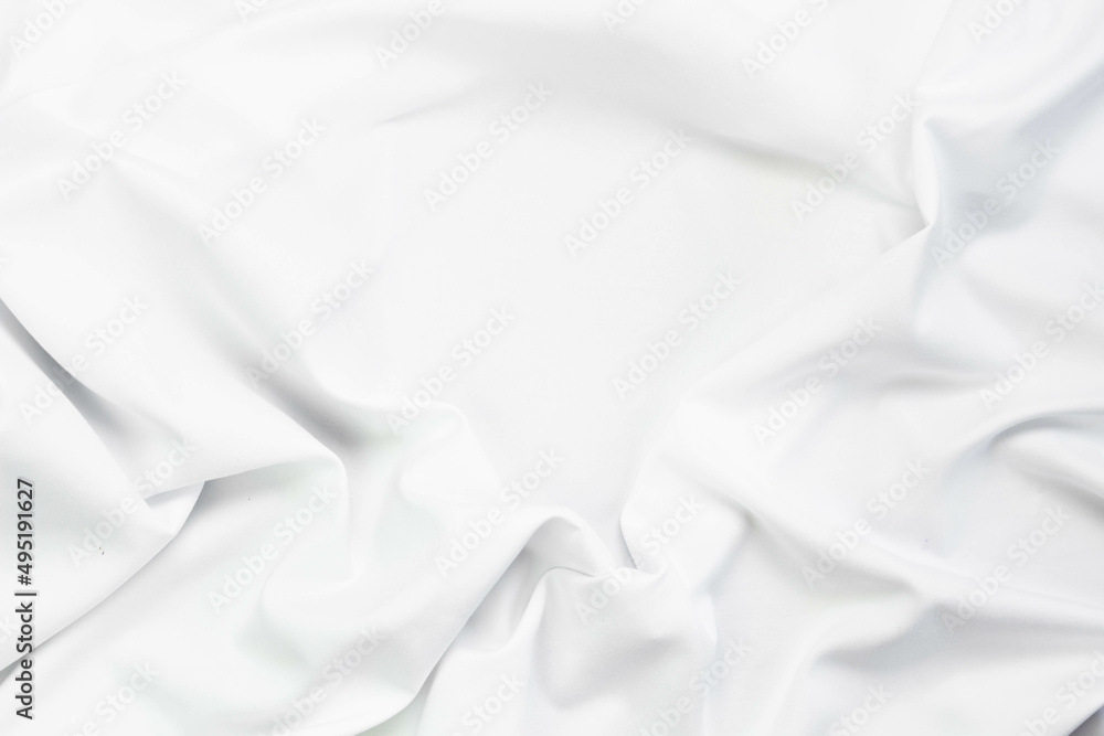 Obraz premium White fabric texture that is white cloth surface background with beautiful soft blur pattern.