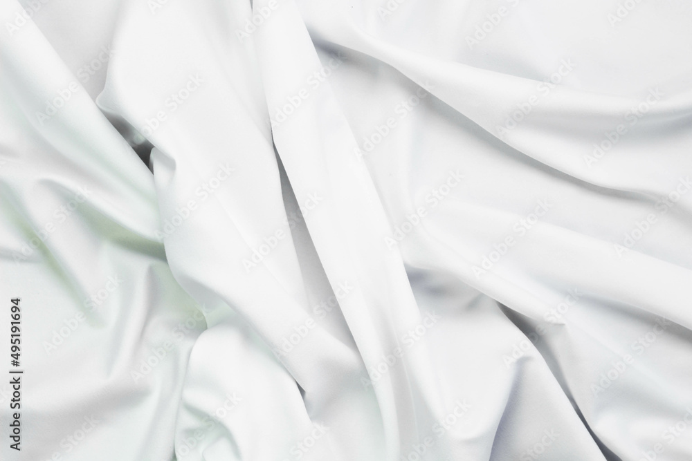 White fabric texture that is white cloth surface background with beautiful soft blur pattern. White fabric texture that is white cloth surface background with beautiful soft blur pattern.