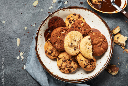 Canvas Print Plate with chocolate cookies and cup of hot coffee