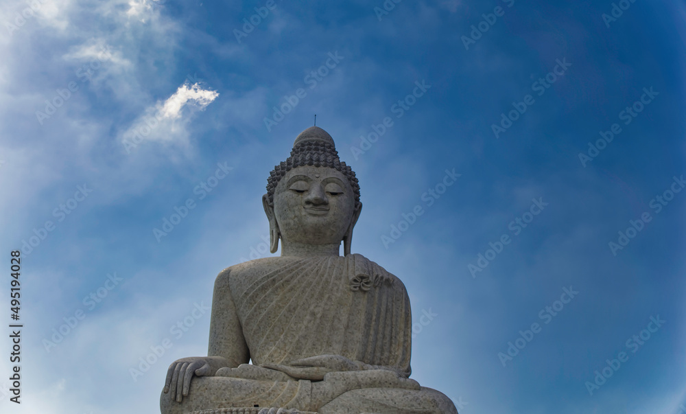 Side view over The Big Buddha or Great Buddha of Phuket, a marble made seated Maravija Buddha statue at Phuket, Thailand. Side view over The Big Buddha or Great Buddha of Phuket, a marble made seated Maravija Buddha statue at Phuket, Thailand.