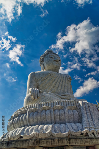 Side view over The Big Buddha or Great Buddha of Phuket, a marble made seated Maravija Buddha statue at Phuket, Thailand.