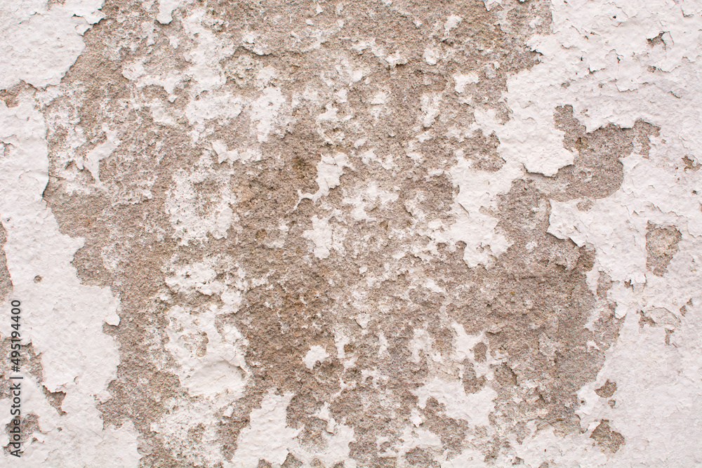 Fototapeta premium old white shabby wall of a building in Portugal