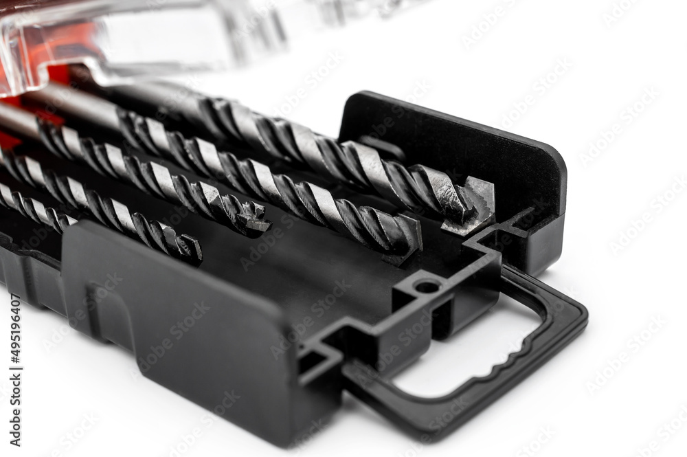 Сoncrete drill bits in box on white background. Сoncrete drill bits in box on white background.
