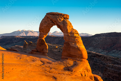 The Delicate Arch and mountain behind it.