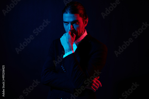 portrait of a man modern style suit fashion dark background © SHOTPRIME STUDIO