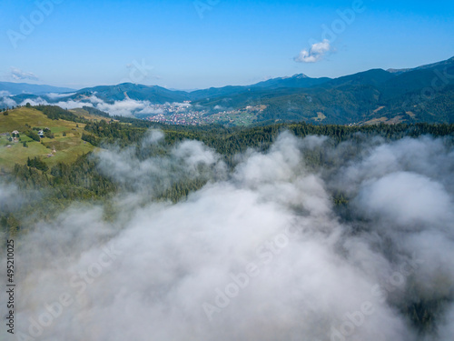 Morning fog in the Ukrainian Carpathians. Aerial drone view.