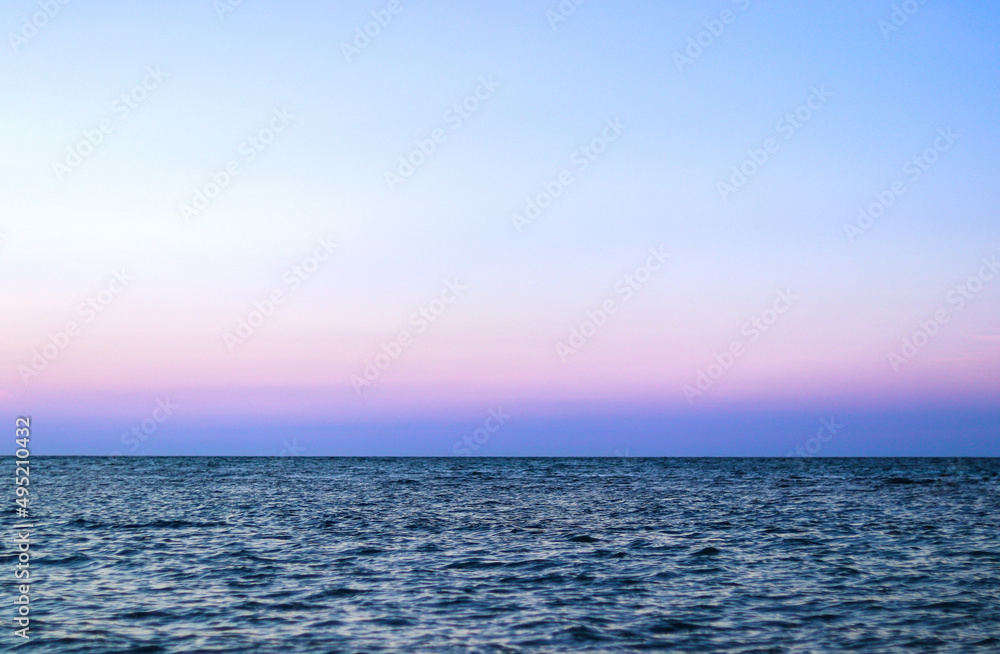 Blue ocean panorama with sun reflection, The vast open sea with clear sky, Ripple wave and calm sea with beautiful sunlight Blue ocean panorama with sun reflection, The vast open sea with clear sky, Ripple wave and calm sea with beautiful sunlight