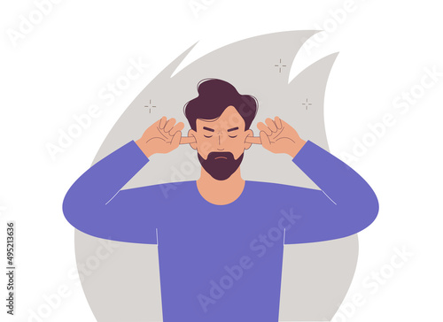 Man while eyes closed covering ears with fingers ignoring annoying sounds and words. I can't see or hear anything. Ignoring problems.