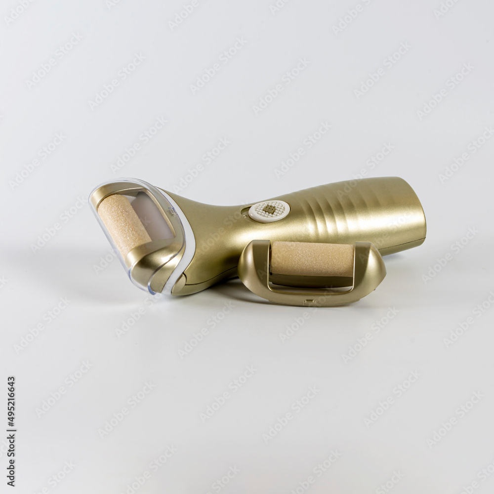 Electric foot and nail file, on white background, feet care. Electric foot and nail file, on white background, feet care.