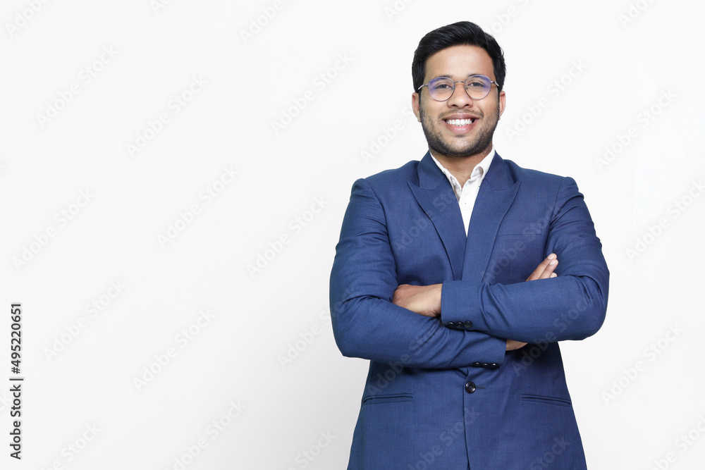 Young hispanic businessman with arms crossed smiling happy. Young hispanic businessman with arms crossed smiling happy.