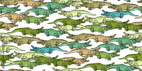 Seamless pattern of colorful crocodiles on white. Design in flat style of wild animals. Hand drawn vector illustration for prints, of clothes, textiles, wrapping paper, fabric, wallpaper, wall art