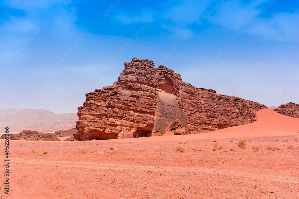Sands and mountains of Wadi Rum desert in Jordan, beautiful daytime landscape Sands and mountains of Wadi Rum desert in Jordan, beautiful daytime landscape