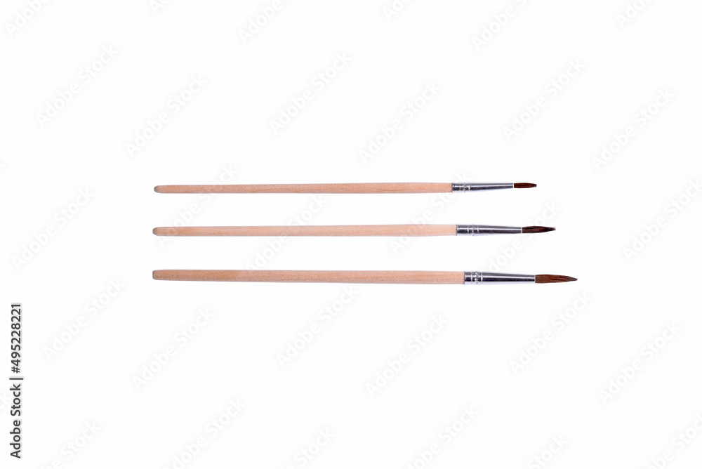 Set of different clean paint brushes isolated on white background Set of different clean paint brushes isolated on white background