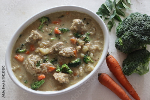 Stewed chicken with vegetables. Kerala style preparation with carrots, broccoli, potato, chicken, coconut milk and spices