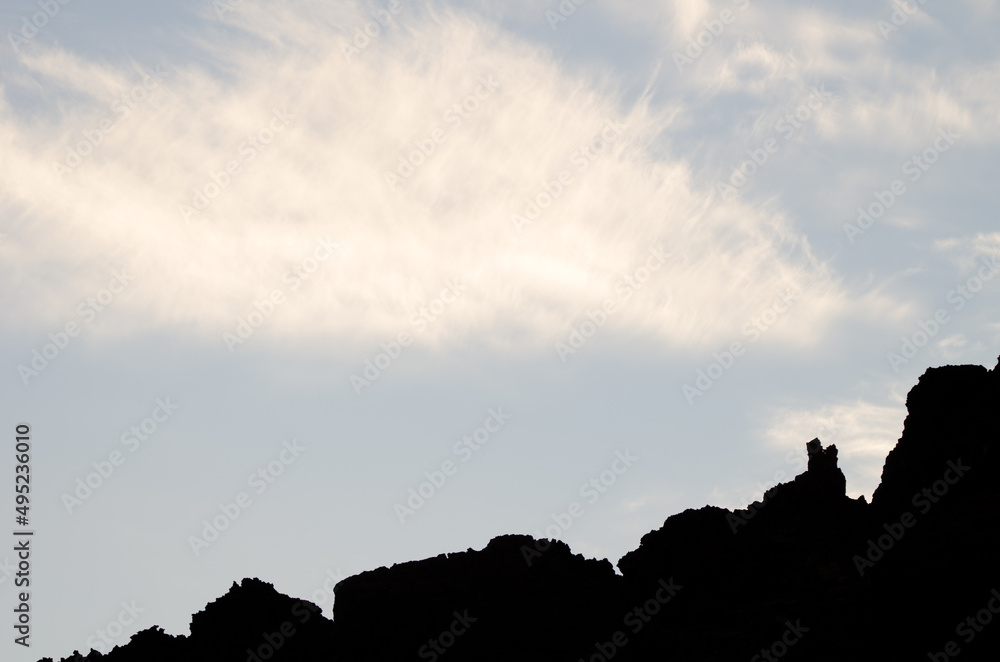 Fototapeta premium Rocky profile and clouds. Teide National Park. Tenerife. Canary Islands. Spain.