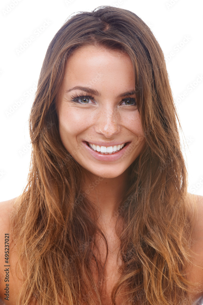 Smiling wide. Beautiful young woman smiling while isolated against a white background. Smiling wide. Beautiful young woman smiling while isolated against a white background.