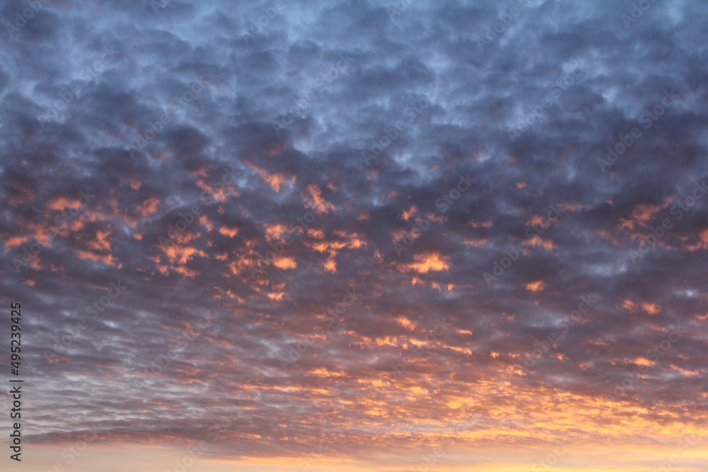 Obraz premium Clouds at sunset. Close up. With the rays of the sun.