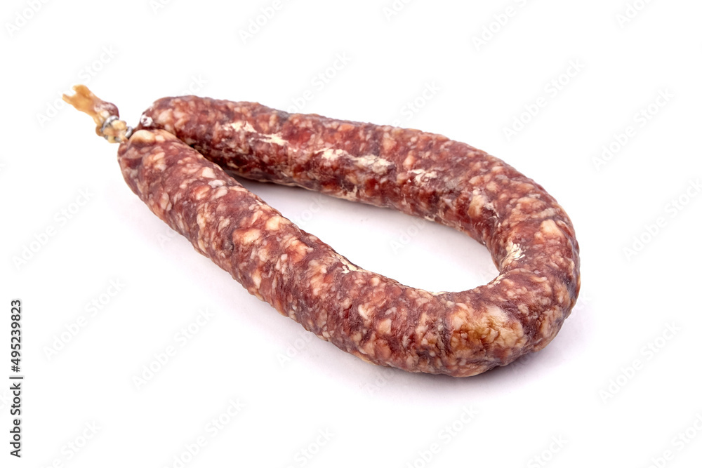 Dry cured pork sausage ring isolated on white Dry cured pork sausage ring isolated on white