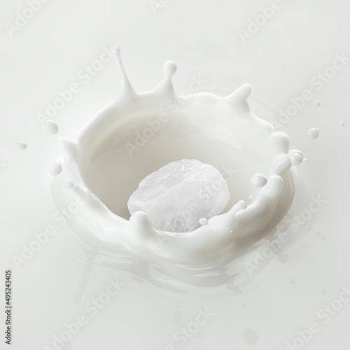 rock sea Salt falls into milk  yoghurt  sour cream  Splash