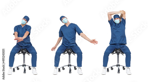 Physical relaxation.Professional medical male,stretching arms, back,neck sitting on mobile saddle - front view	