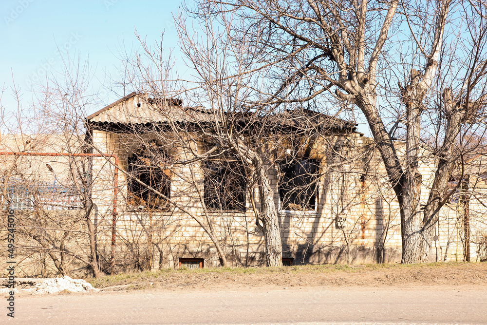 Burnt house from bomb explosion Burnt house from bomb explosion