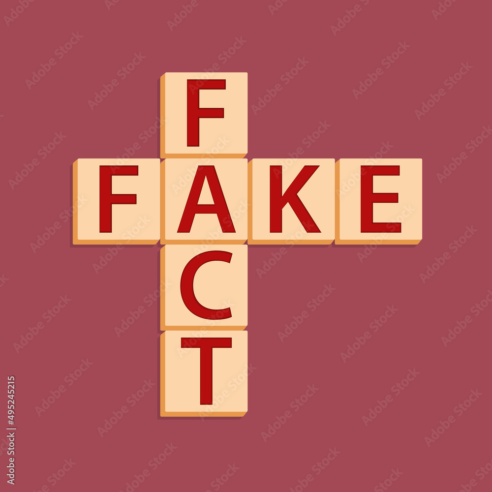 Fact or fake text cubes in the form of a crossword puzzle on a burgundy