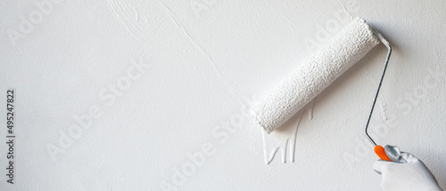 Konstfotografi Roller Brush Painting, Worker painting on surface wall  Painting apartment, renovating with white color  paint