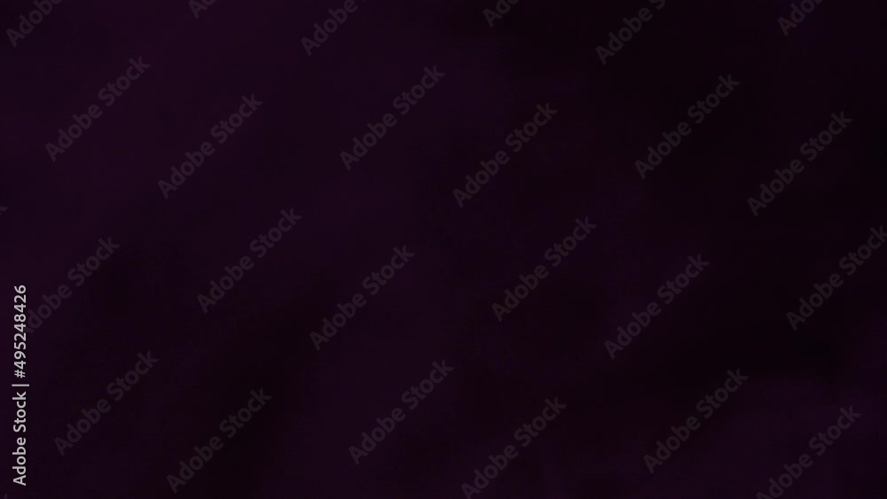 Emitting beautiful juicy multi-colored hookah smoke on a black background close-up