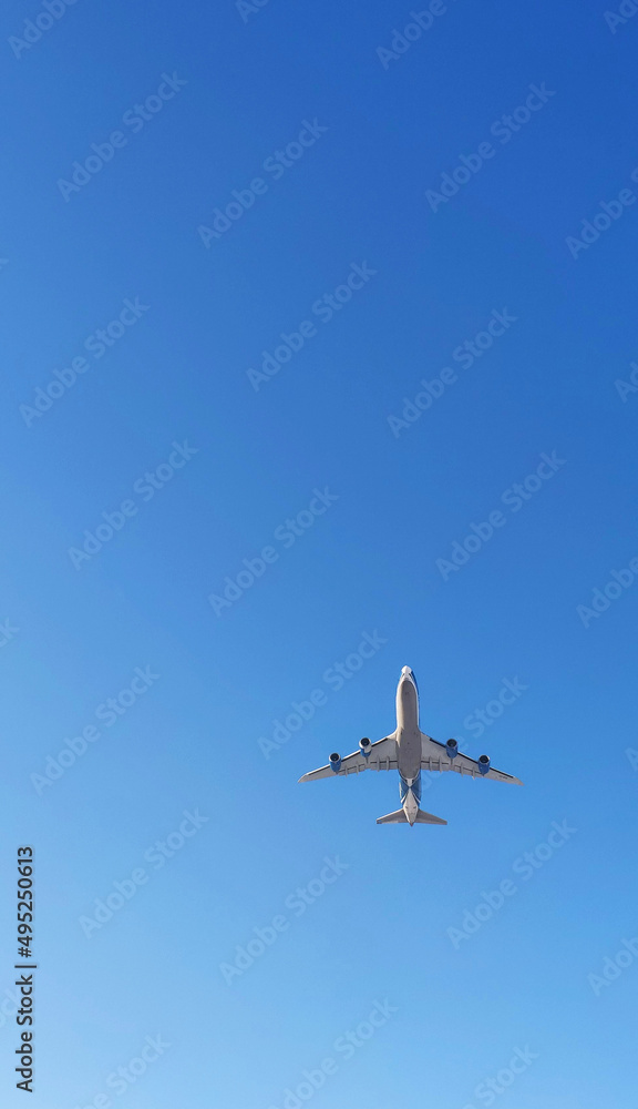 Airplane in the blue sky. Flight. Trips. Spotting. Airplane in the blue sky. Flight. Trips. Spotting.