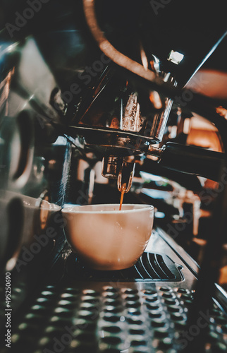coffee machine making espresso coffee in cafe