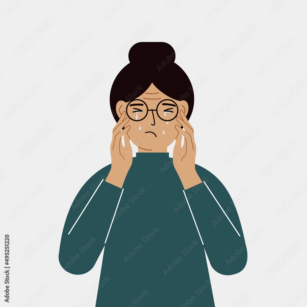 Upset woman cries and holds his head with his hands. The concept of resentment, pain and depression. Upset woman cries and holds his head with his hands. The concept of resentment, pain and depression.