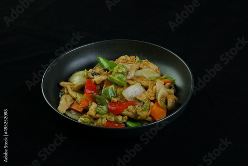 Roast with chicken, mushrooms, broccoli and peppers - Chinese food. top view. far eastern food