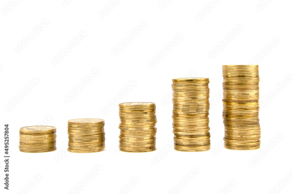 Stacks of Ukrainian coins in order of growth. White background. The concept of revenue growth. Business success. The growth of economics. Stacks of Ukrainian coins in order of growth. White background. The concept of revenue growth. Business success. The growth of economics.