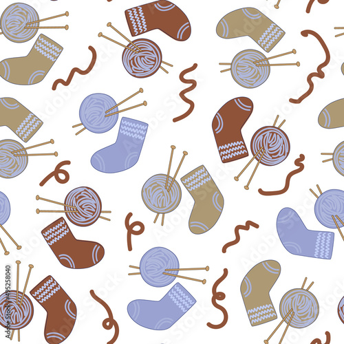 Seamless pattern on the theme of knitting , knitted socks, doodle vector.