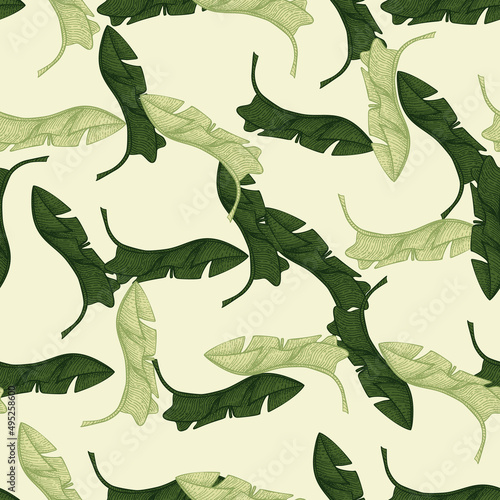 Banana leaves seamless pattern.Vintage tropical branch in engraving style. © Lidok_L
