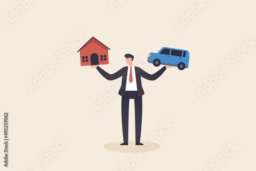Businessman holding loan house and car. Financial and business risk, banking loan and debt risk, stability or balance of economics.