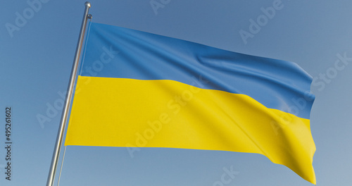 Ukrainian national official flag on blue sky background