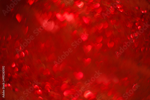 Red background with bokeh in the form of hearts