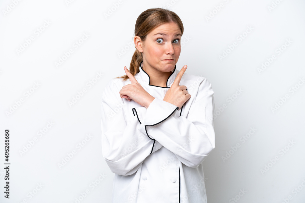 Young chef woman isolated on white background pointing to the laterals having doubts Young chef woman isolated on white background pointing to the laterals having doubts