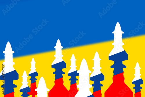 Silhouettes of combat missiles on the background of the flag of Ukraine. Conflict between Russia and Ukraine. The concept of militarization. photo