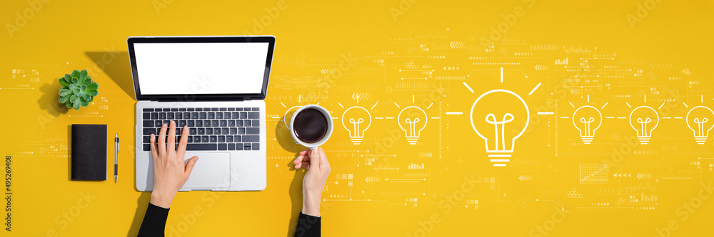 Idea light bulb theme with person using a laptop computer - obrazy, fototapety, plakaty 