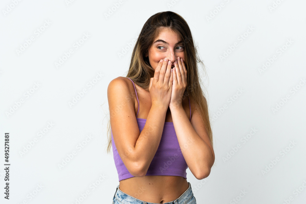 Young caucasian woman isolated on white background happy and smiling covering mouth with hands Young caucasian woman isolated on white background happy and smiling covering mouth with hands