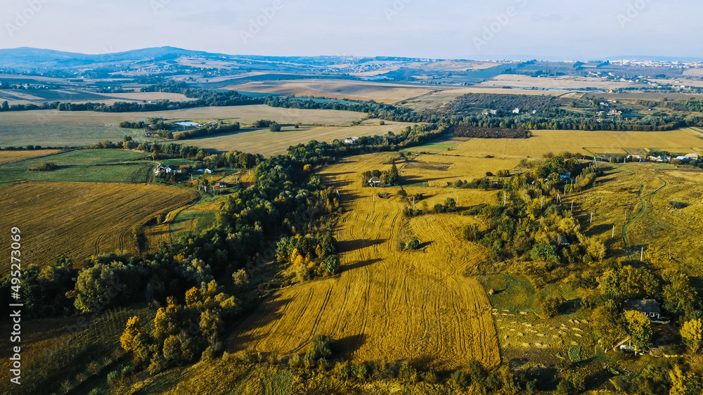 Flight over the fields behind the western Ukrainian village Aerial view