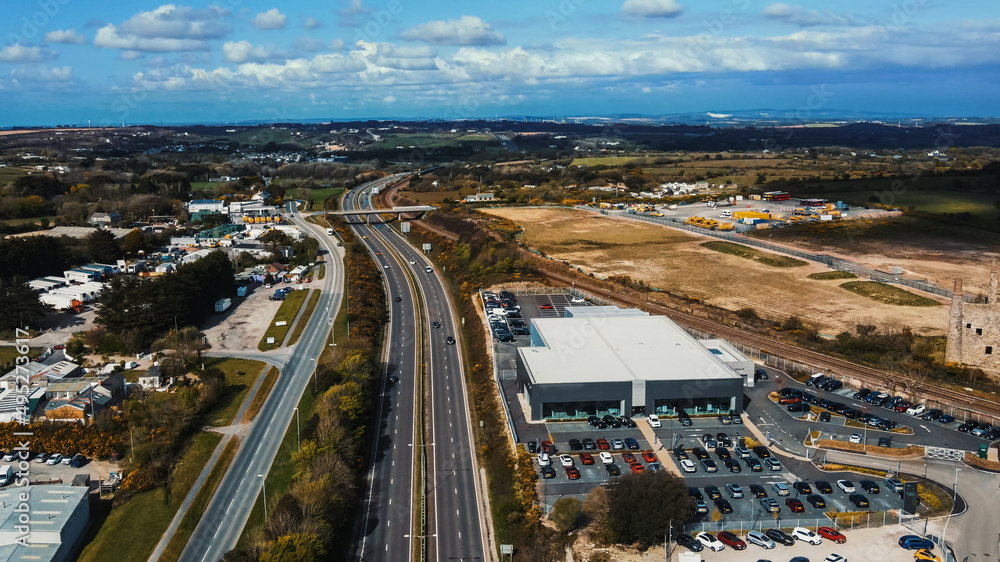 Fototapeta premium Cars are moving on the highway Parking with many different vehicles