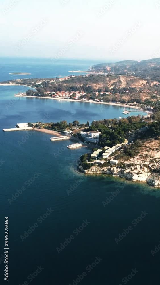 Aerial view of town on coastline by sea Aerial view of town on coastline by sea
