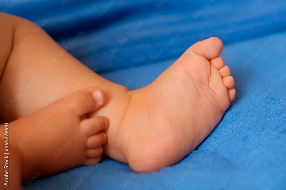Baby legs on the bed Baby legs on the bed