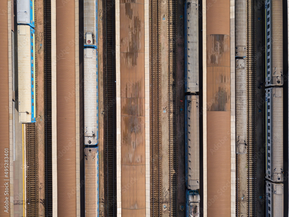Railway station in the city. Aerial drone top view. Railway station in the city. Aerial drone top view.